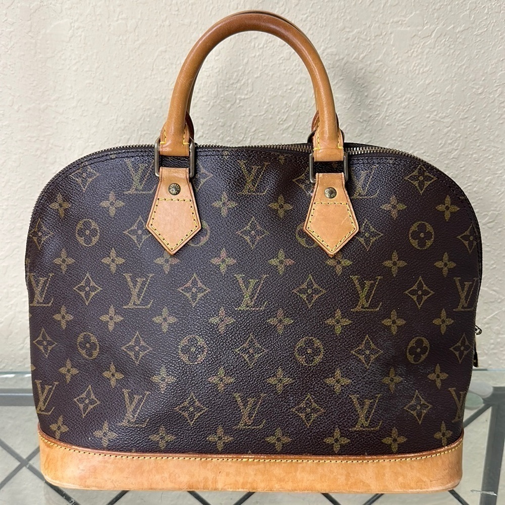 1 𝑳𝒐𝒖𝒊𝒔 𝑽𝒖𝒊𝒕𝒕𝒐𝒏 𝑨𝑳𝑴𝑨 𝑷𝑴 (Date Code BA0955)